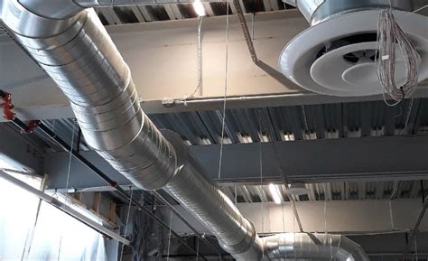 Exposed ductwork installation at new Ikea store in 